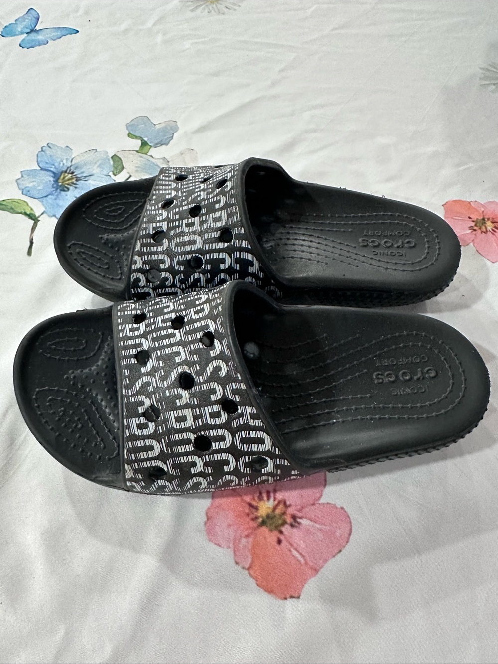 CROCS Black Slides with White Logo Pattern